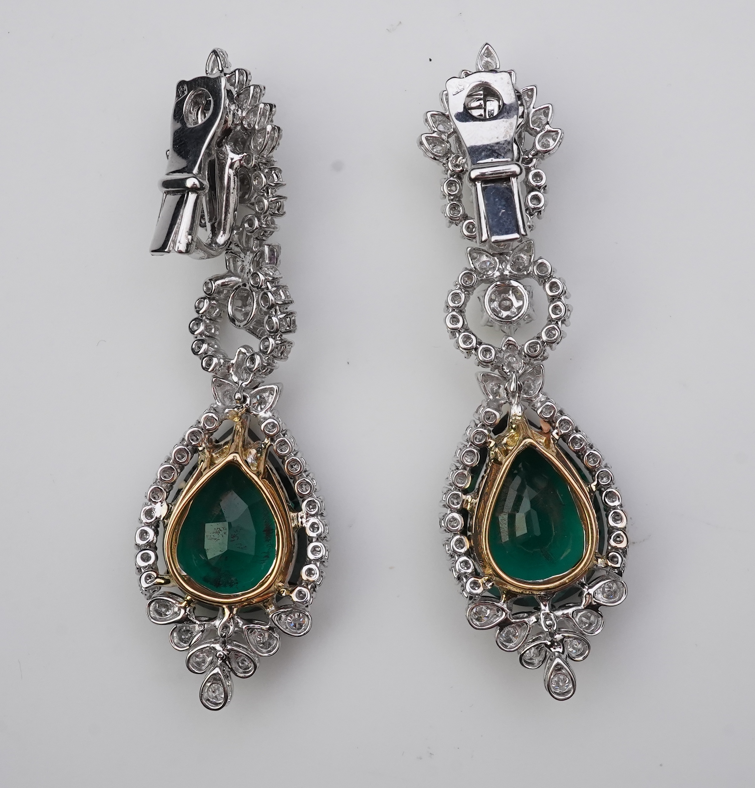 A pair of synthetic green quartz and diamond earrings